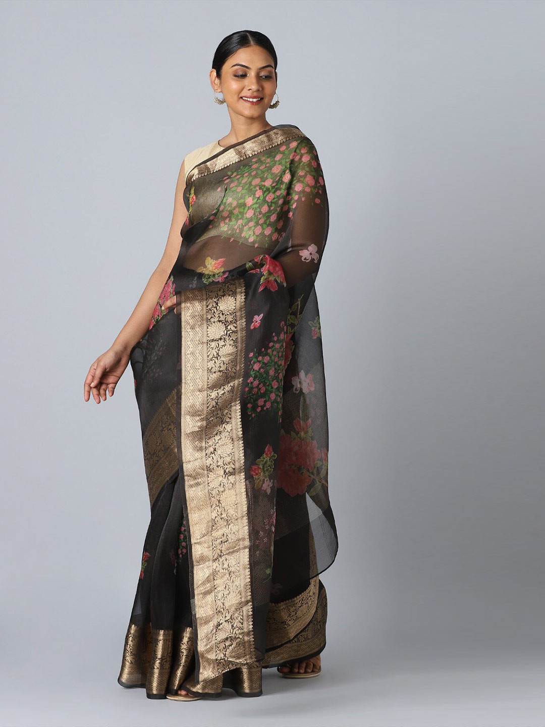 

Taneira Women Black & Gold-Toned Floral Zari Organza Saree