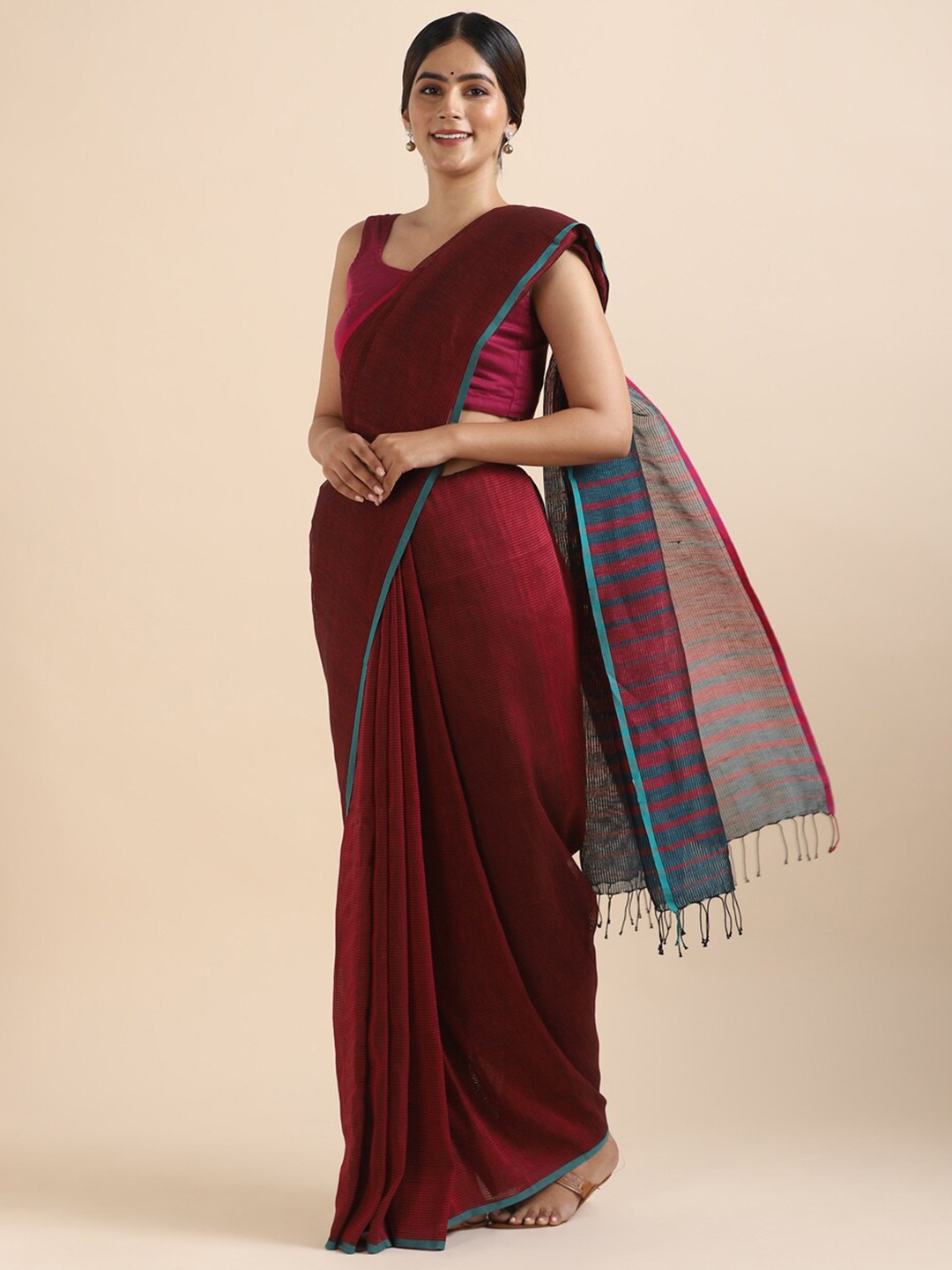 

Taneira Women Red & Blue Pure Linen Saree