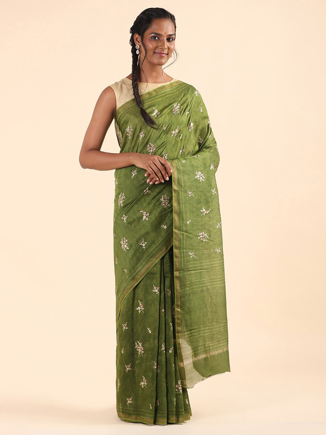 

Taneira Women Green & Gold-Toned Floral Zari Silk Cotton Saree