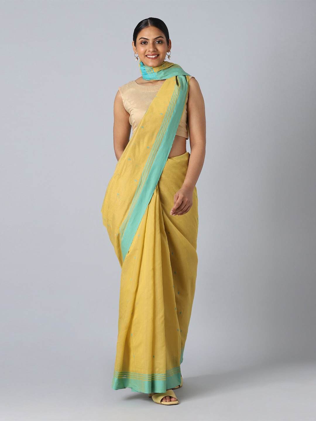 

Taneira Women Yellow & Blue Woven Design Pure Cotton Chanderi Saree