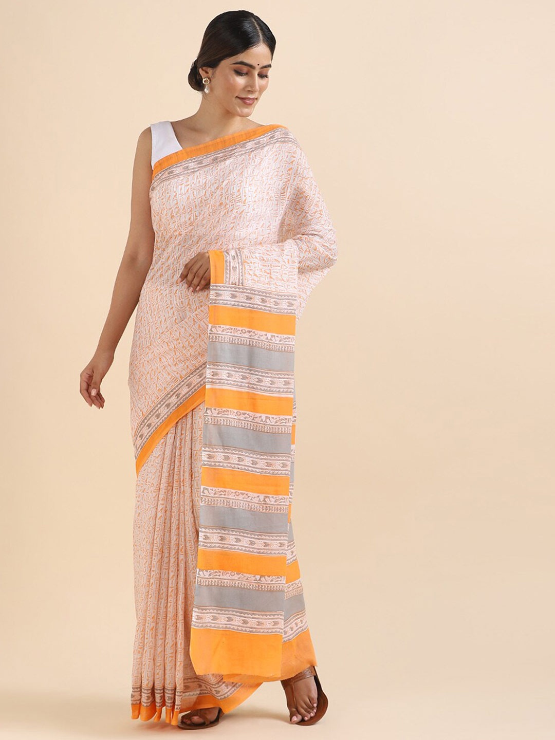 

Taneira Orange & Cream-Coloured Pure Cotton Saree