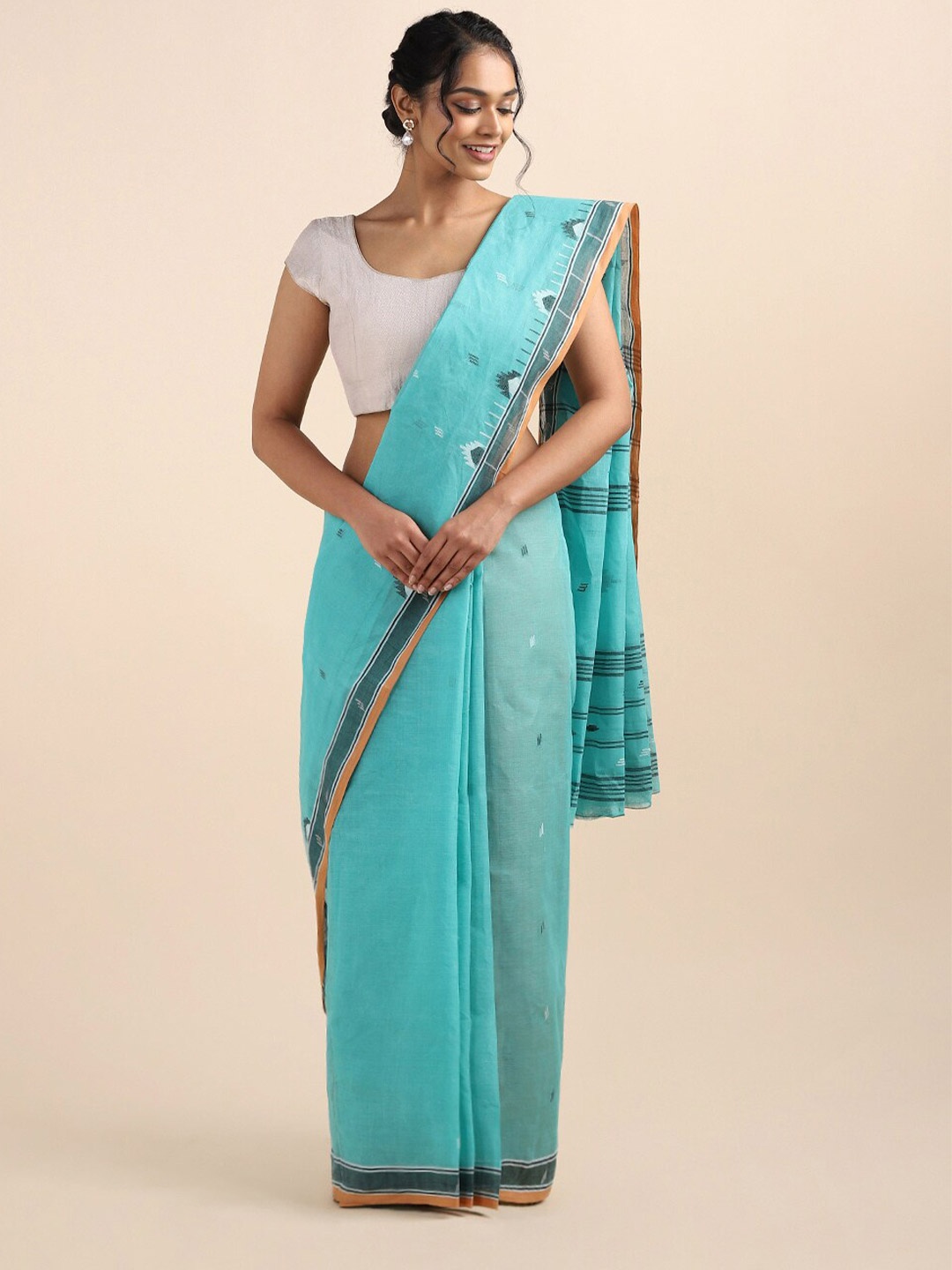 

Taneira Blue & White Ethnic Motifs Pure Cotton Saree