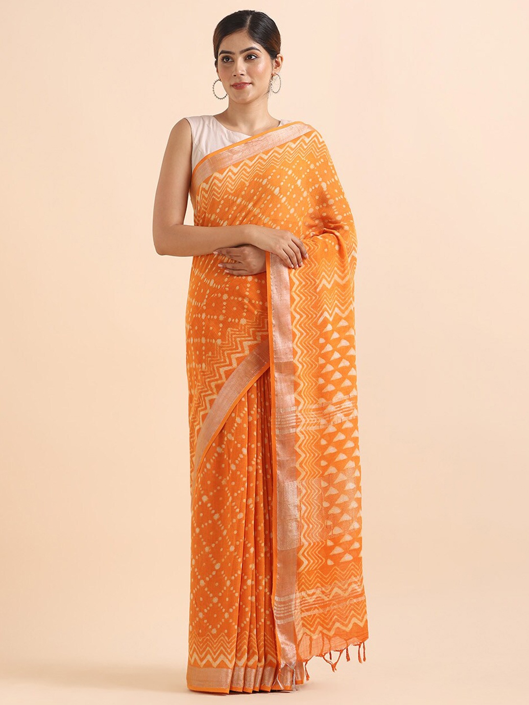 

Taneira Orange & White Batik Zari Pure Linen Bagru Saree