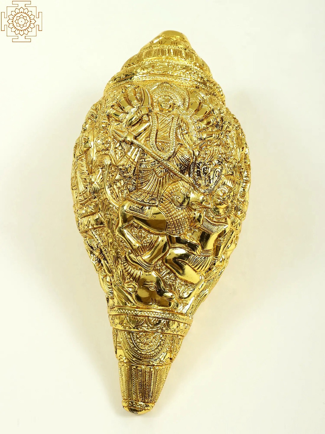 

Exotic India 10" Durga Story Carving On Brass Conch Wall Hanging, Gold