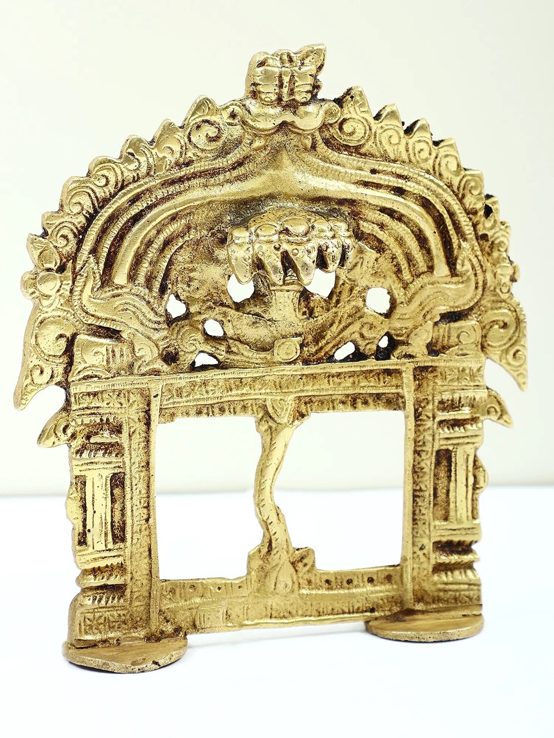 

Exotic India Gold-Toned Kirtimukha Prabhavali Wall Art