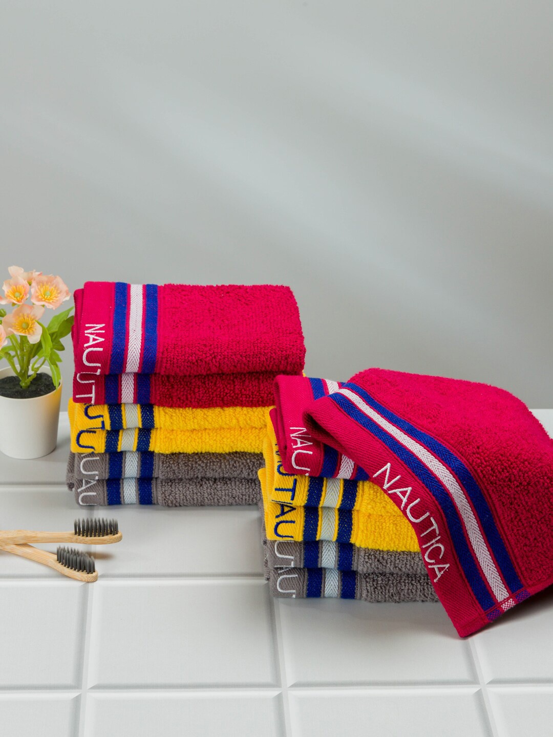 

Nautica Set Of 12 Solid 500 GSM Pure Cotton Face Towels Set, Multi
