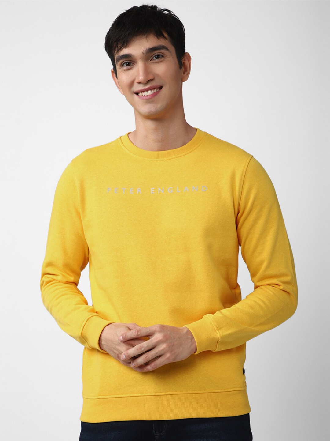 

Peter England Casuals Men Yellow Printed Sweatshirt