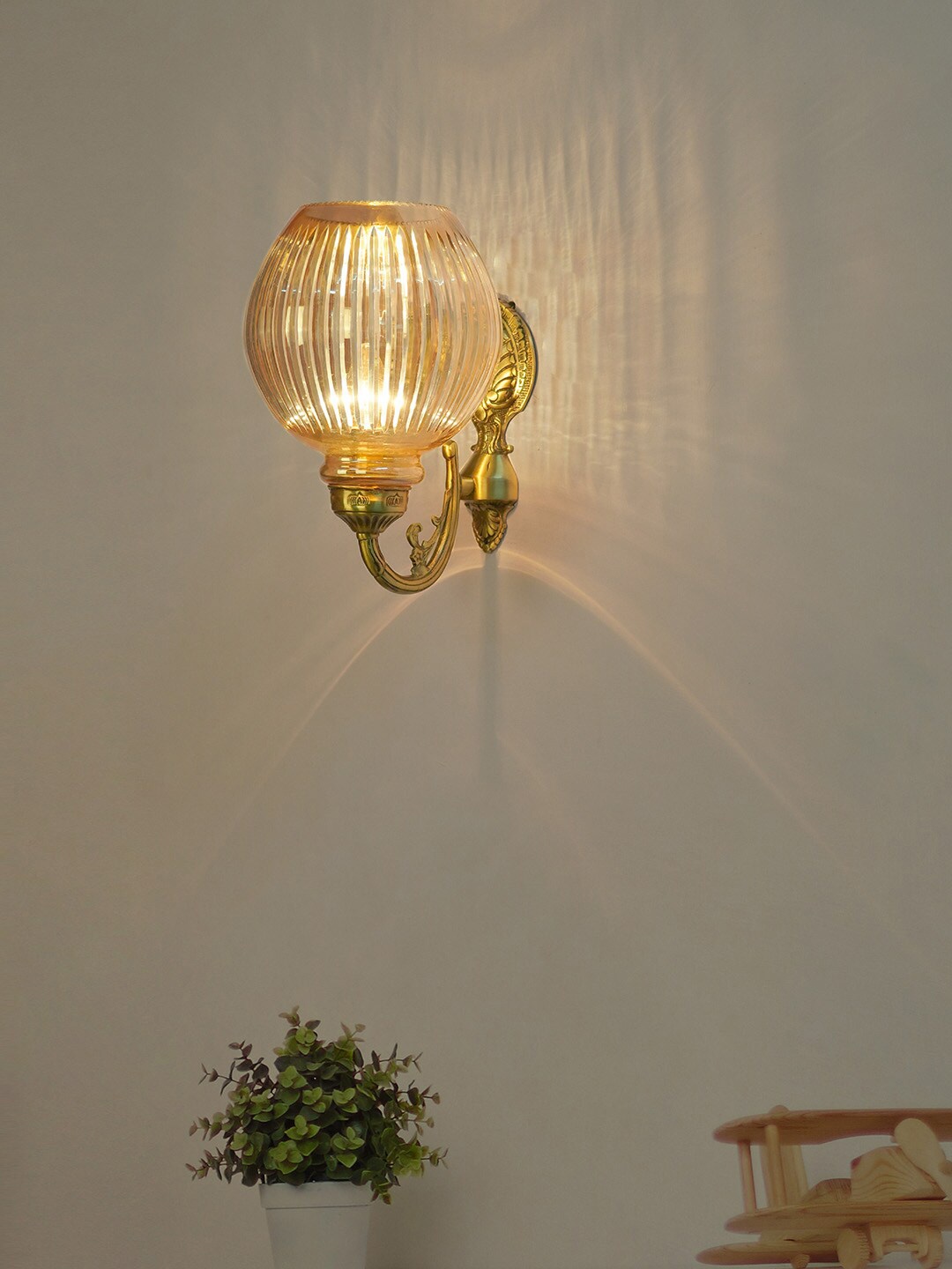 

Fos Lighting Gold-Toned Textured Traditional Wall Lamps