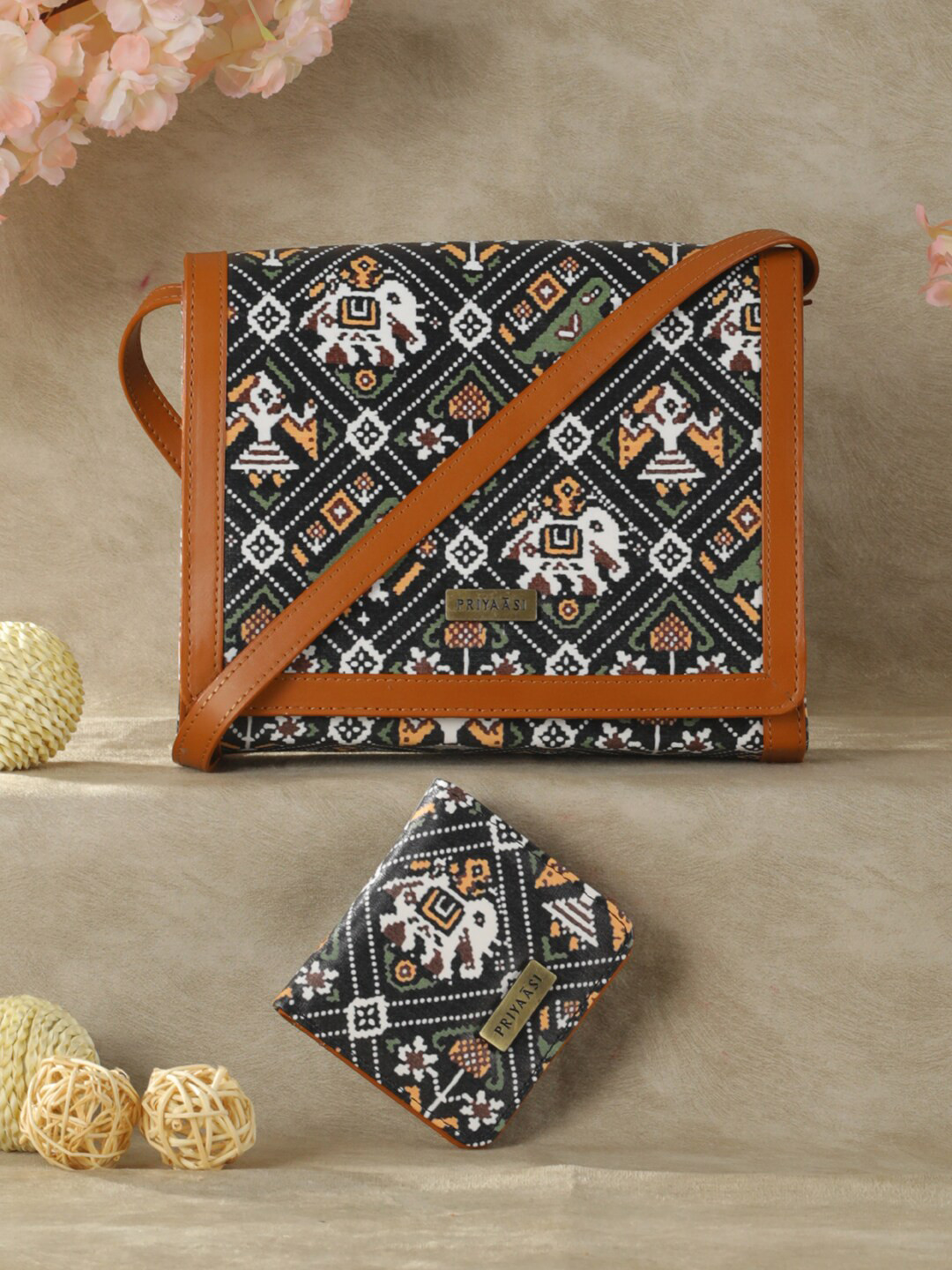 

Priyaasi Women Black Floral Printed PU Structured Sling Bag