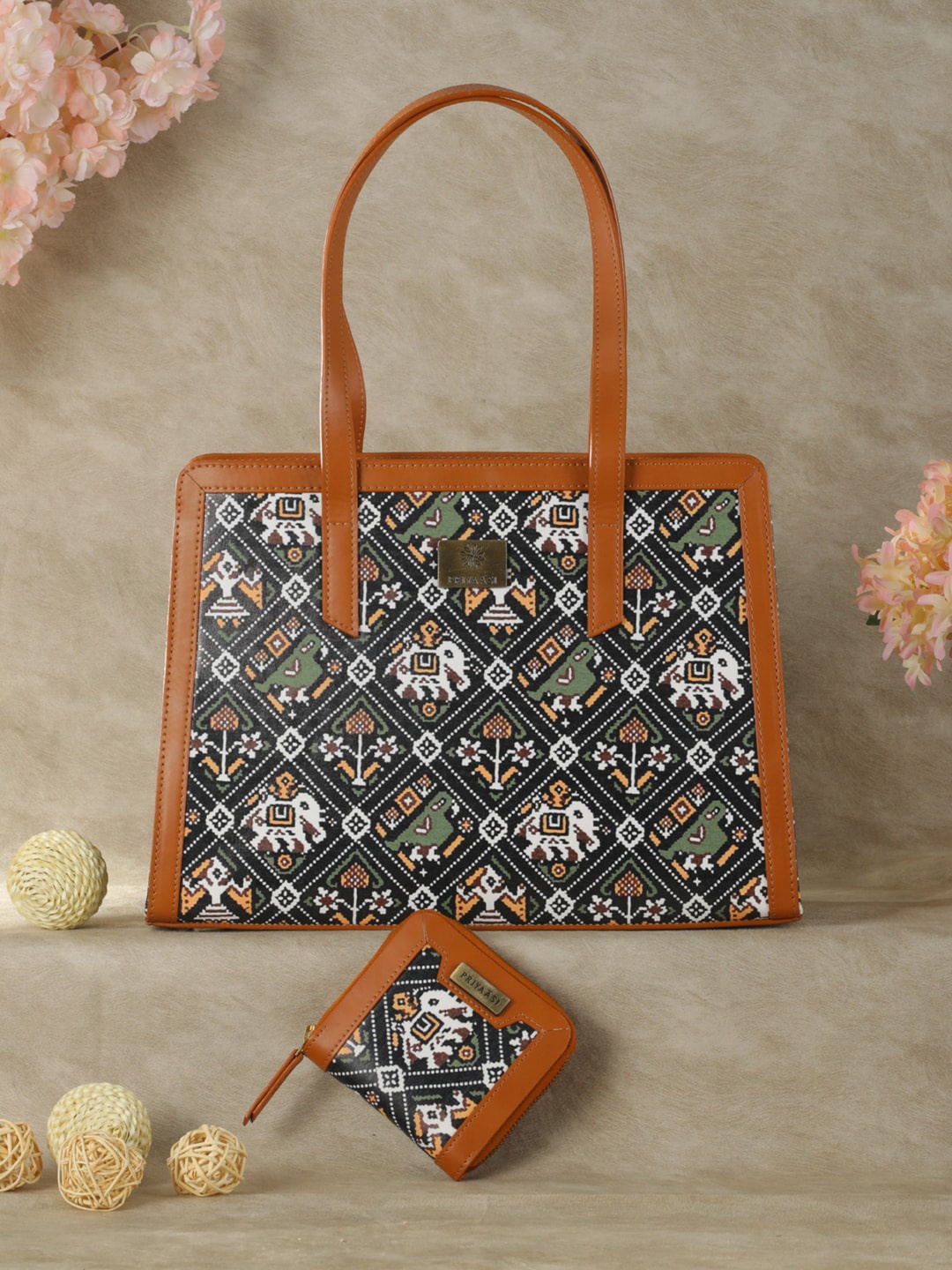 

Priyaasi Black Ethnic Motifs Printed PU Tote Bag With Mini Wallet