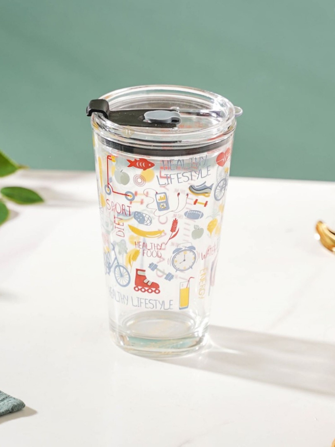 

Nestasia Transparent Printed Glass Tumbler With Lid 400 ml