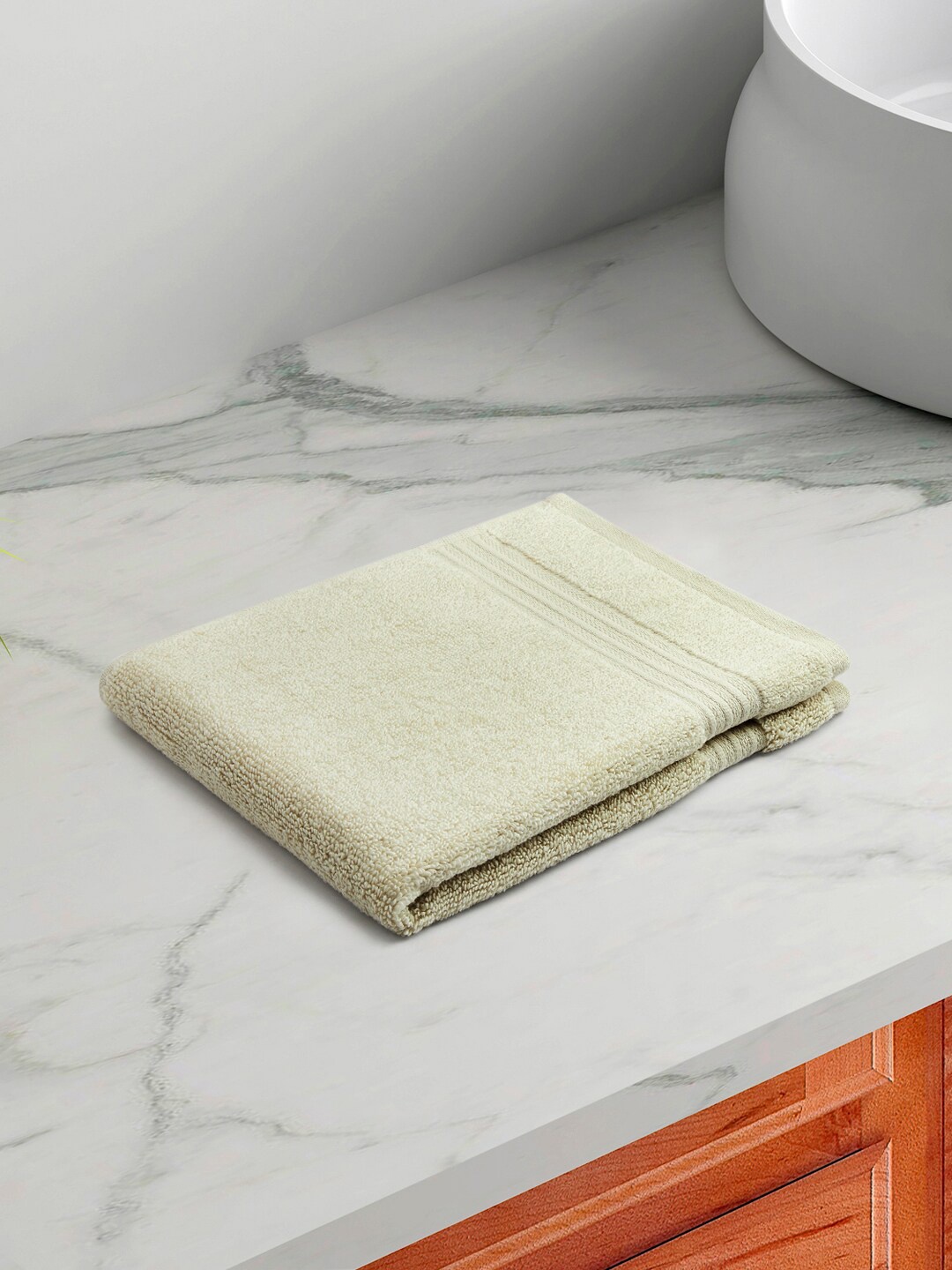 

Living scapes by Pantaloons Beige Solid Pure Cotton Face Towel