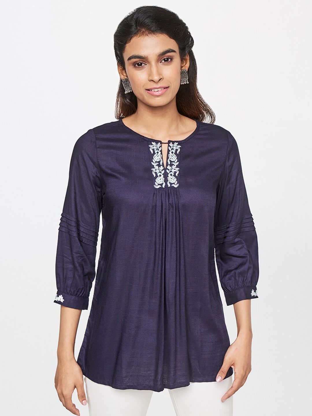 

Global Desi Women Blue Keyhole Neck Top