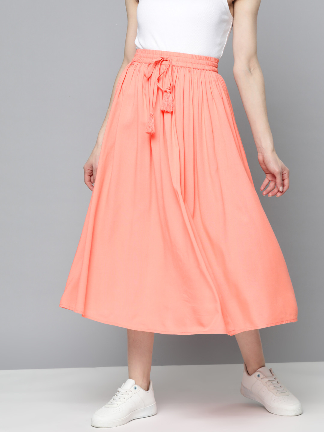 

Mast & Harbour Women Peach-Coloured Solid Flared Midi Skirt
