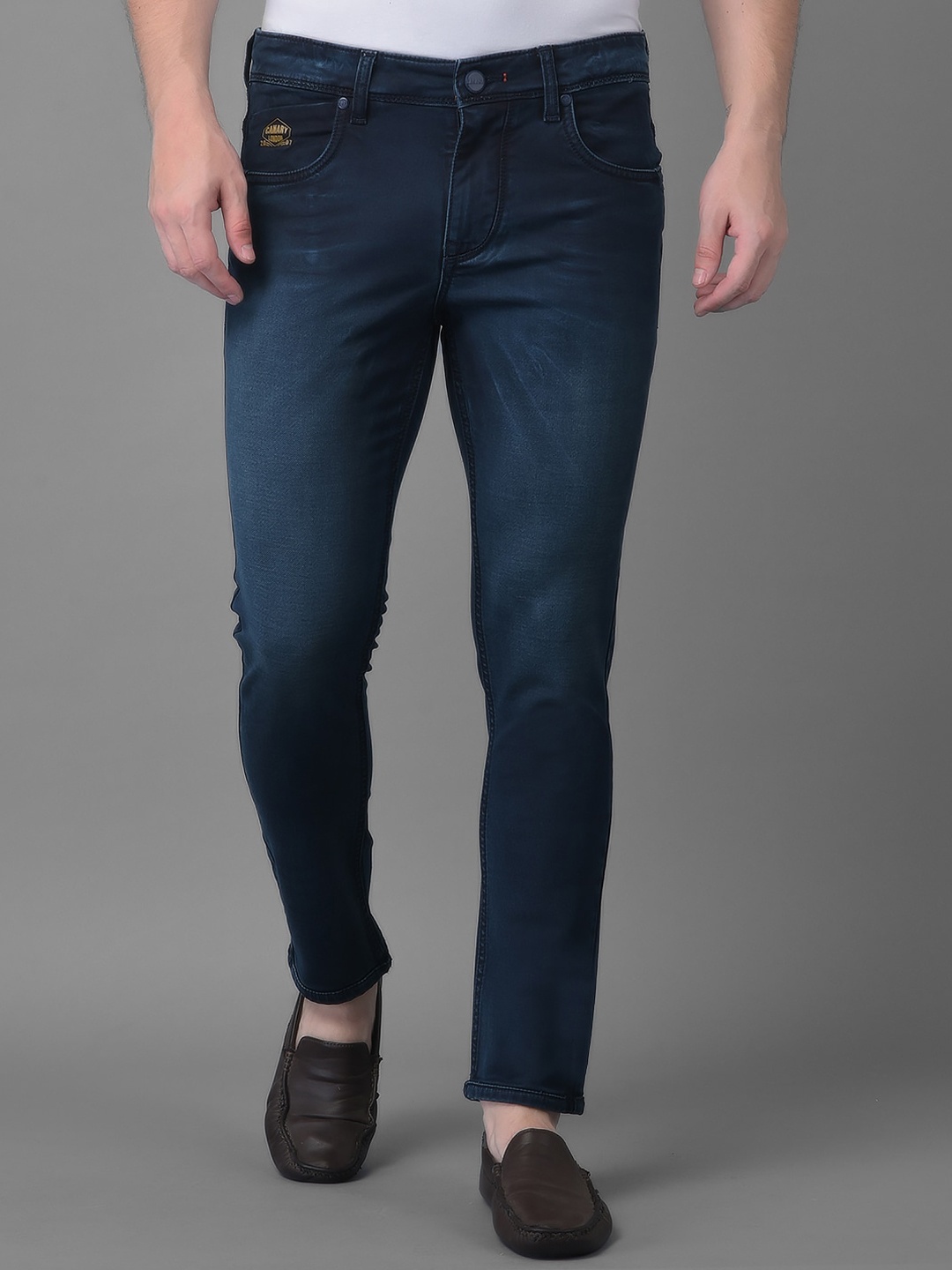 

Canary London Men Blue Smart Tapered Fit Low-Rise Light Fade Stretchable Jeans