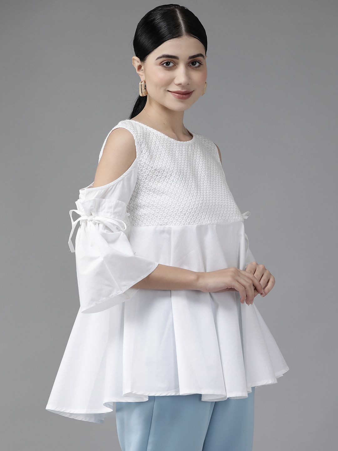

Aarika White Cinched Waist Top