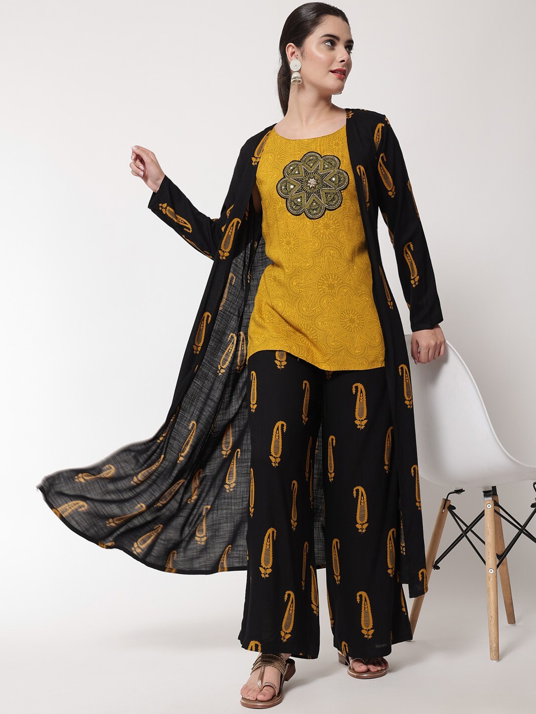 

Nehamta Women Black Ethnic Motifs Printed Kurti with Palazzos with Shrugh