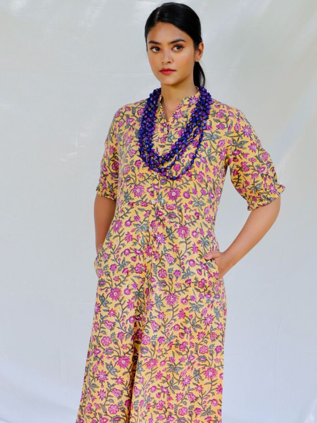 

Shuddhi Women Yellow & Pink Printed Cotton A-Line Ethnic Dresses