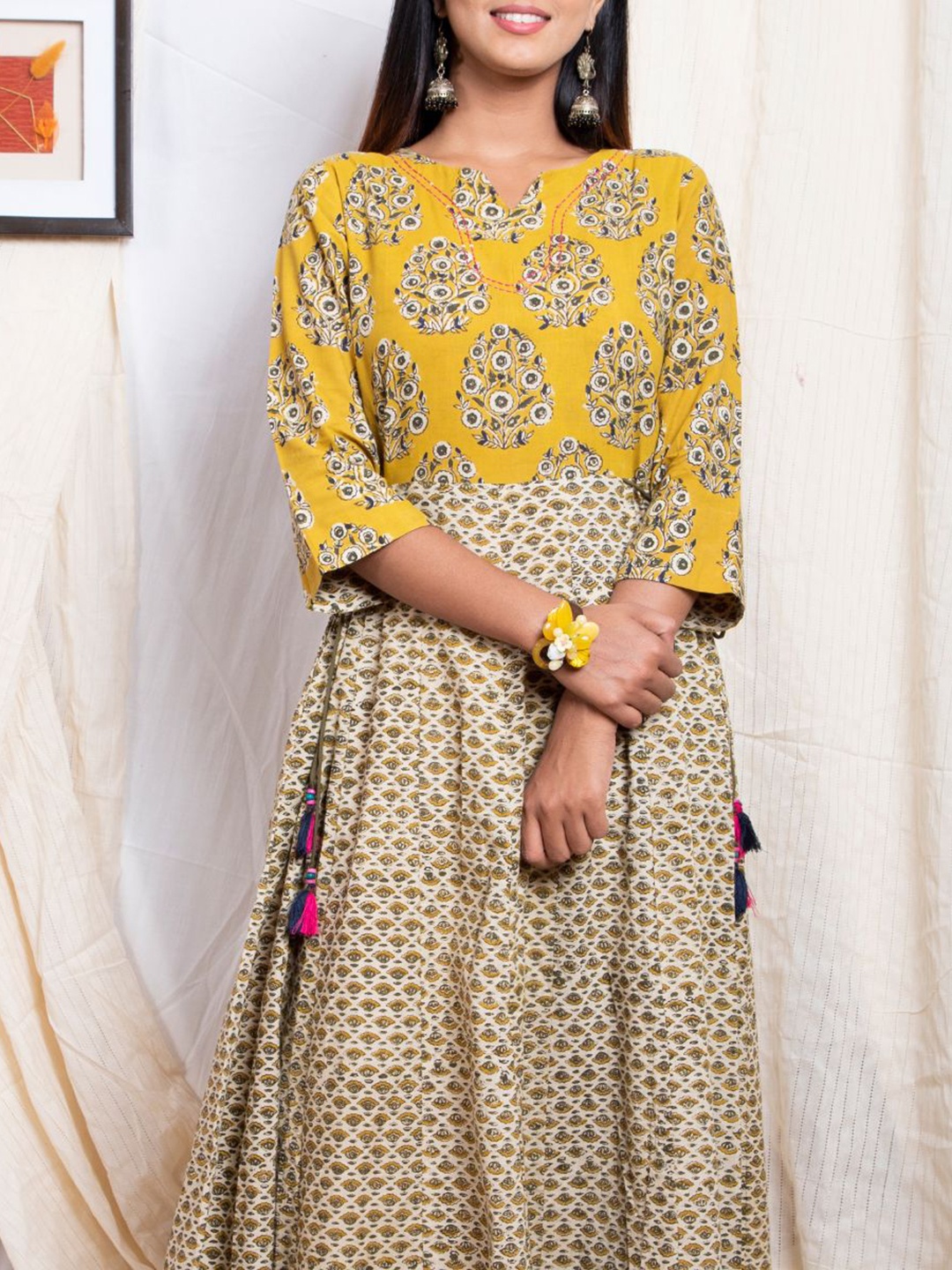 

Shuddhi Women Yellow Printed Cotton Maxi Dress