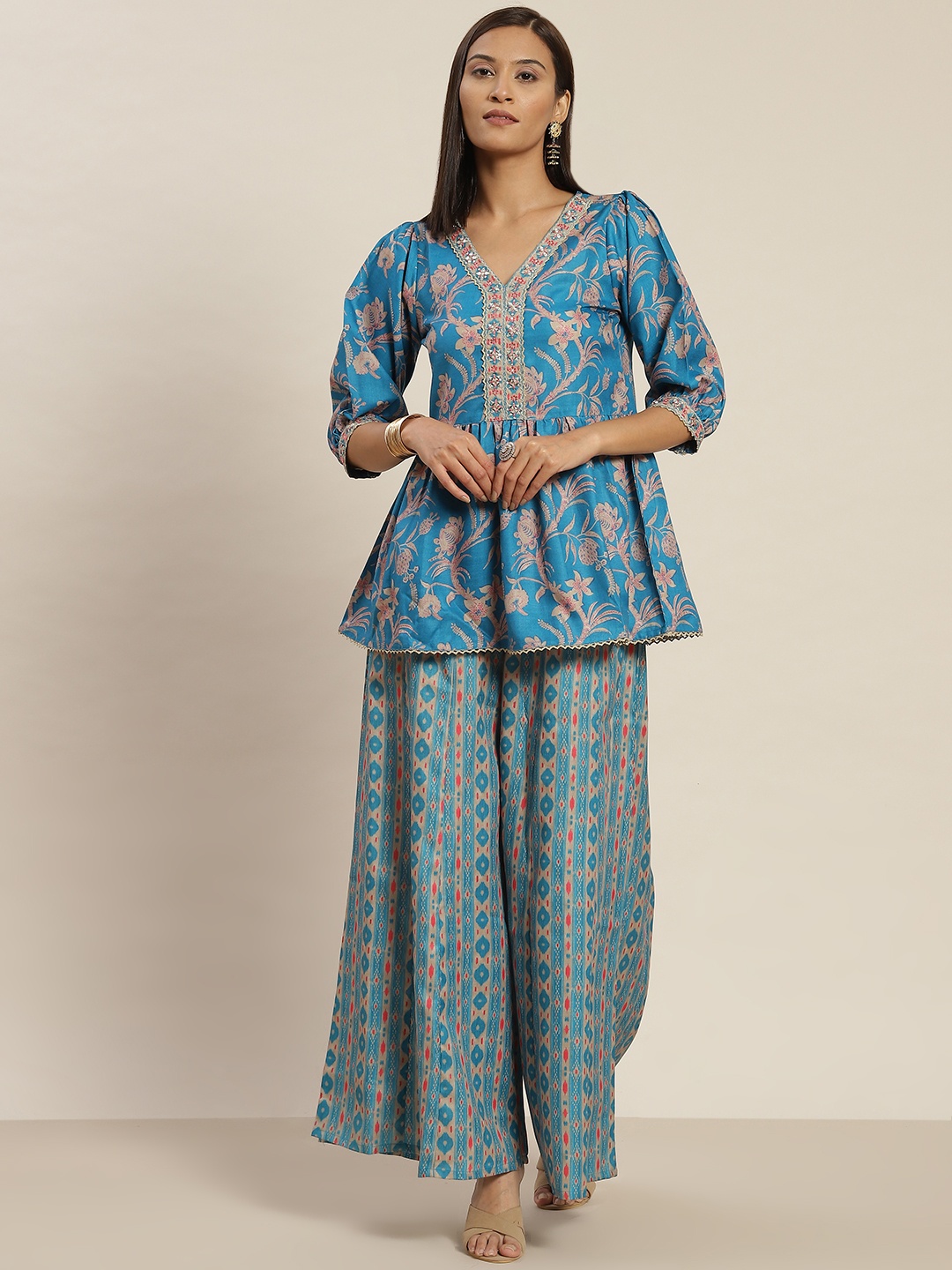 

Jaipur Kurti Women Blue Floral Printed Pleated Sequinned Peplum Top with Palazzos