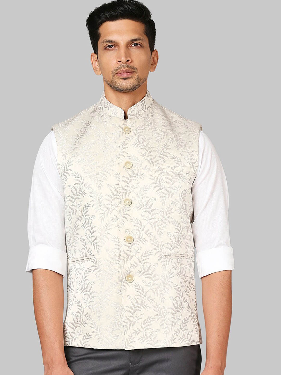 

Raymond Men Beige Woven Design Waistcoat