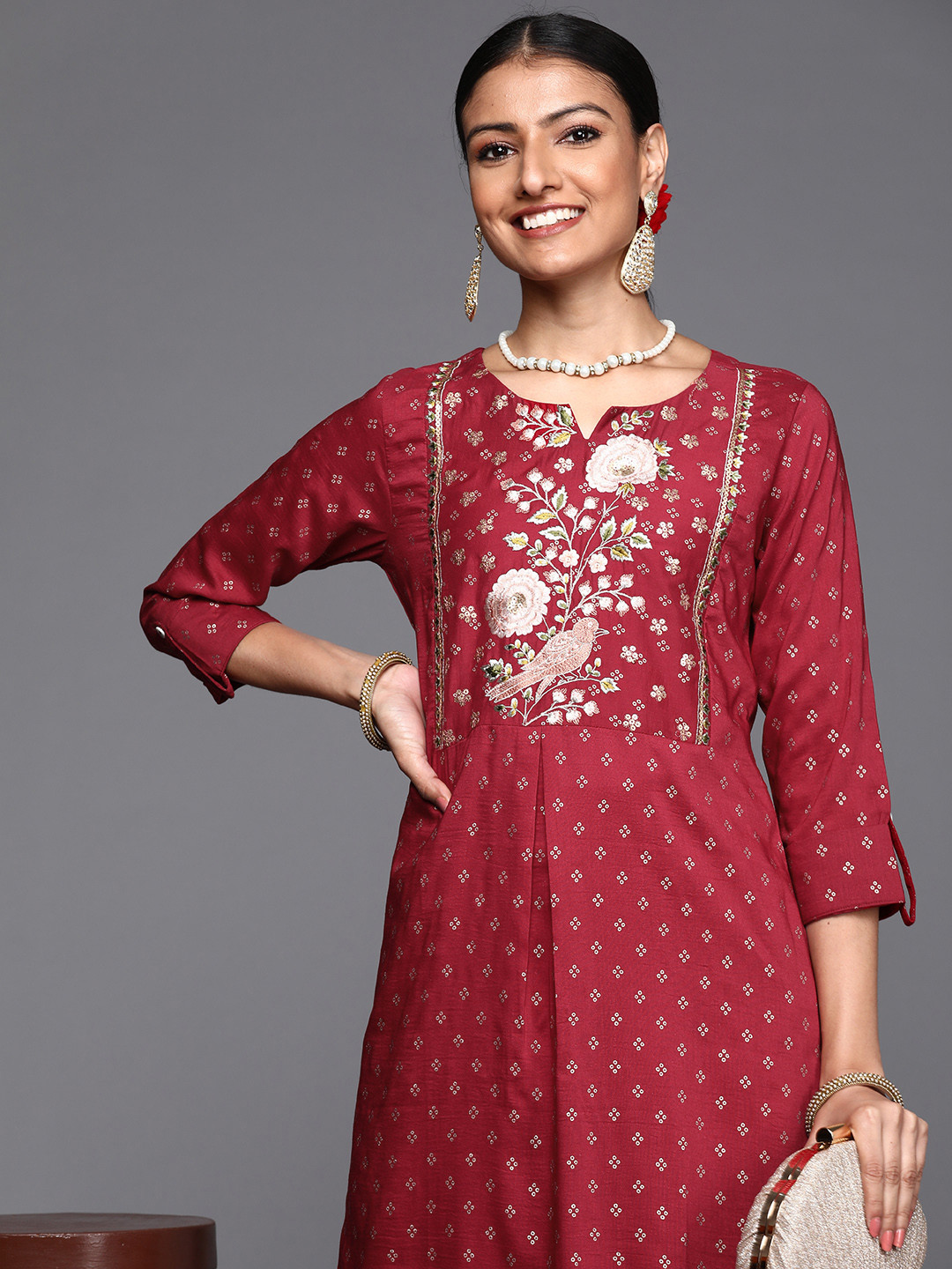 

Varanga Women Maroon & Golden Ethnic Motifs Printed Kurta