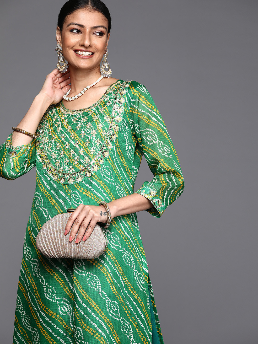 

Varanga Women Green & Golden Ethnic Motifs Embroidered Kurta