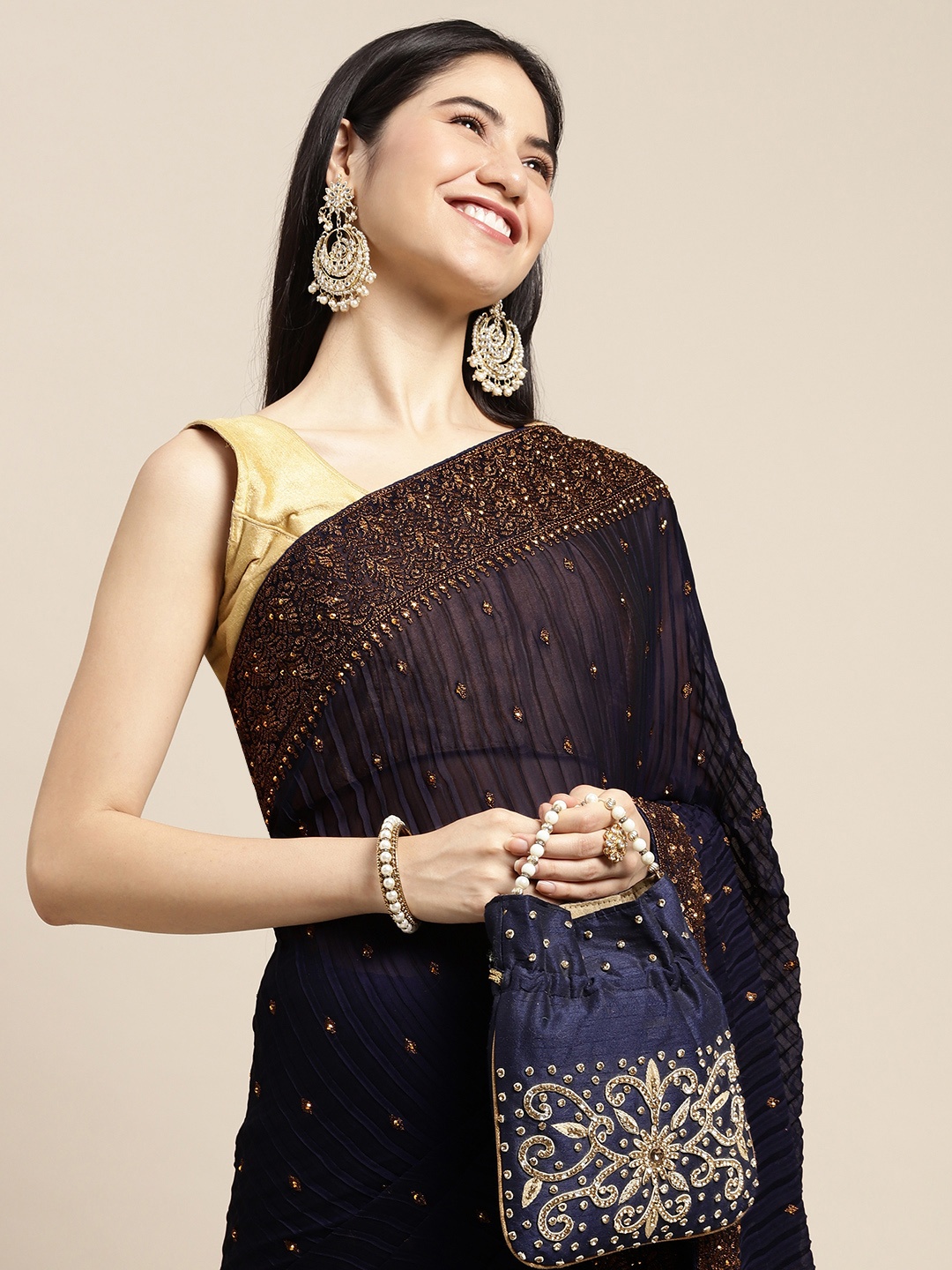 

Pothys Navy Blue Embellished Beads and Stones Pure Chiffon Saree