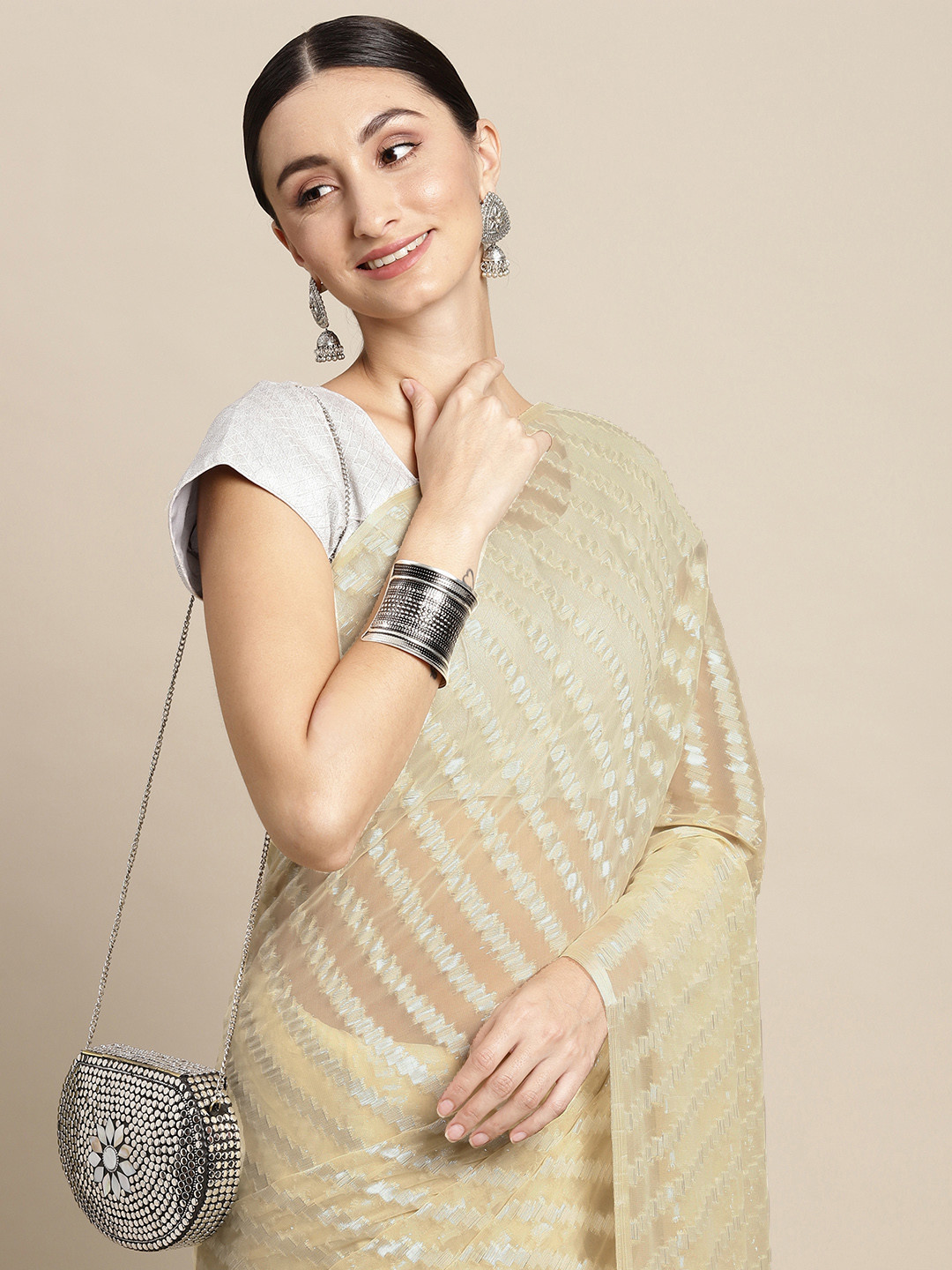 

Pothys Beige & White Striped Embroidered Pure Chiffon Saree