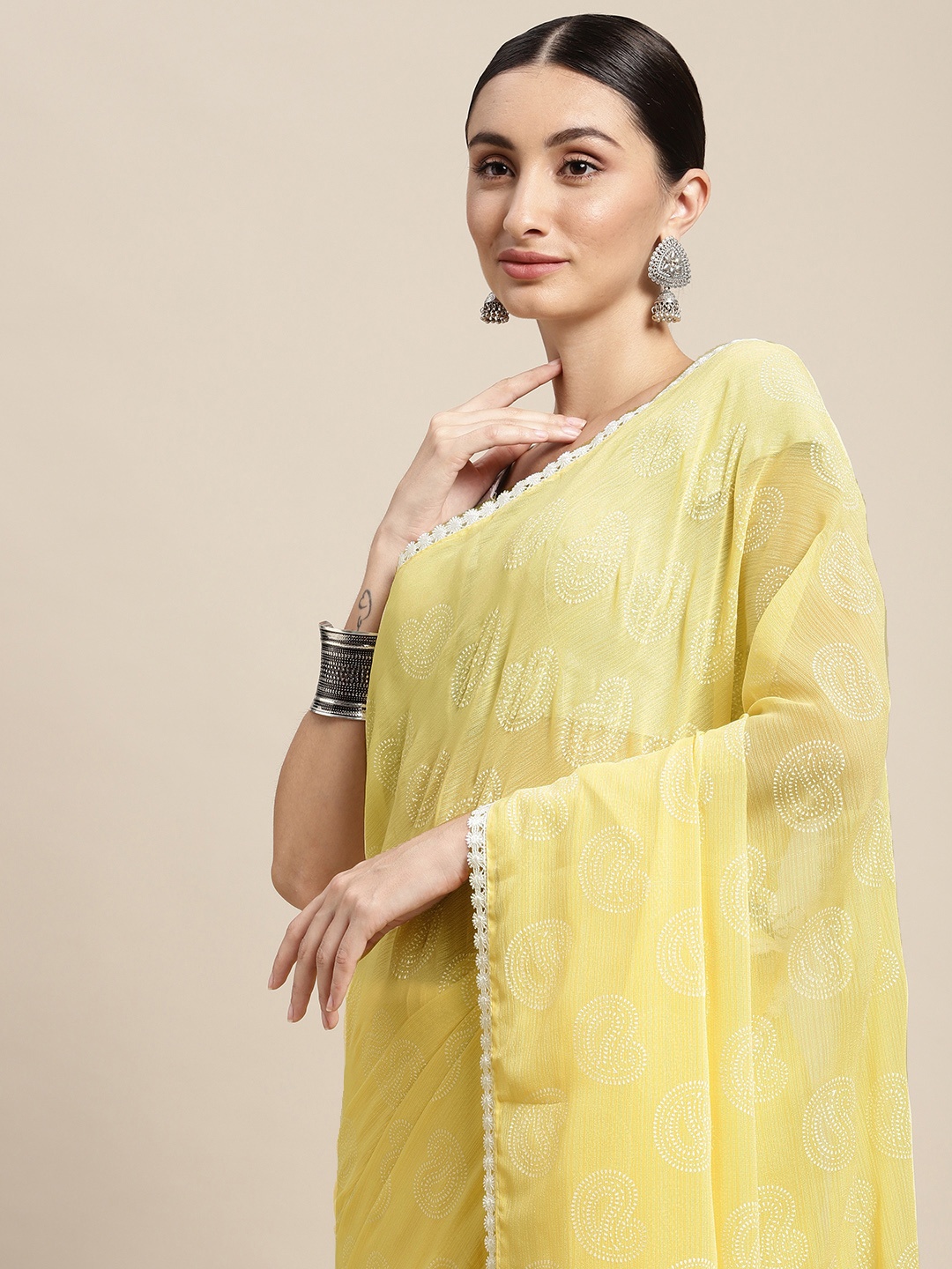 

Pothys Yellow & White Paisley Pure Chiffon Saree