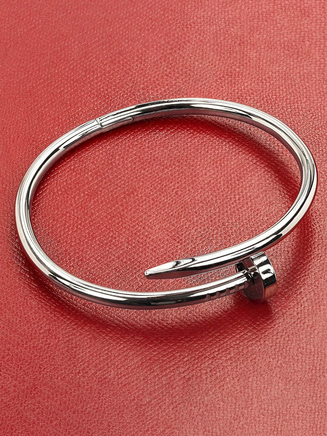 

Yellow Chimes Women Silver Nail Bracelet
