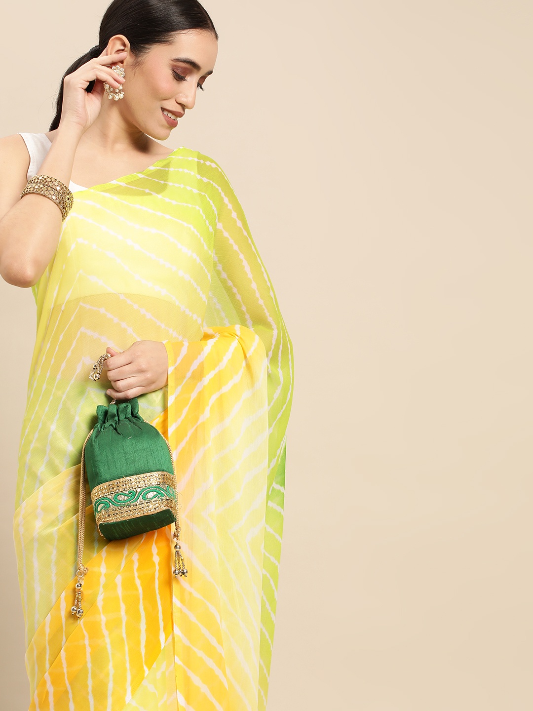 

Rani Saahiba Green & Yellow Leheriya Saree
