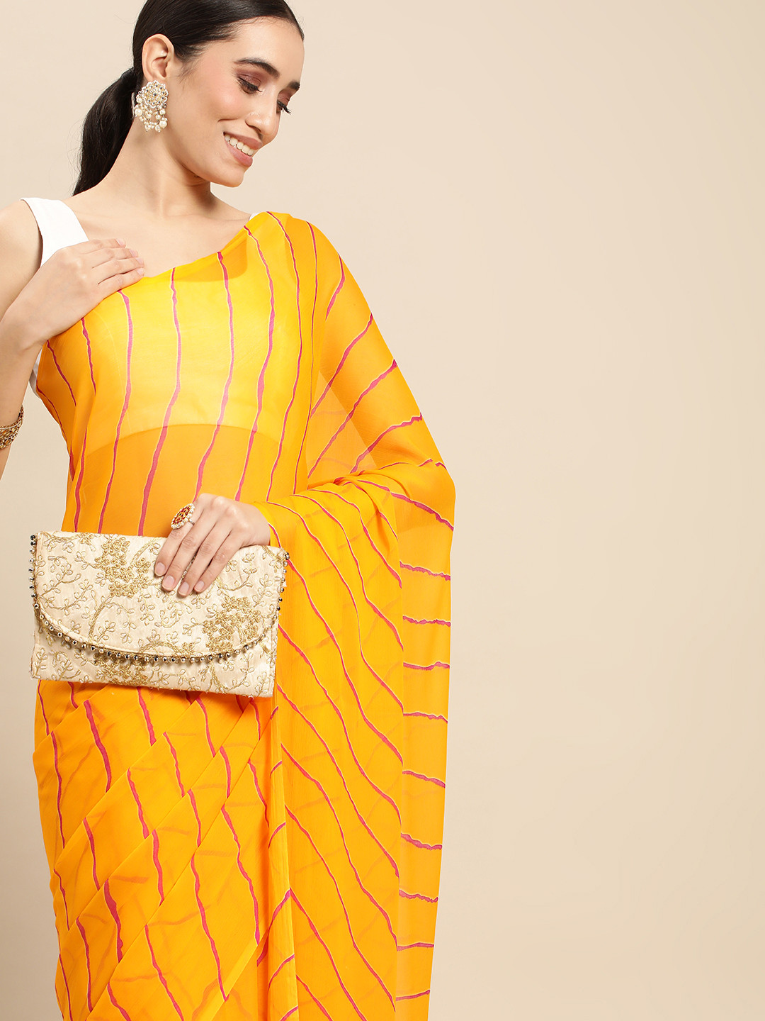 

Rani Saahiba Yellow & Pink Leheriya Saree