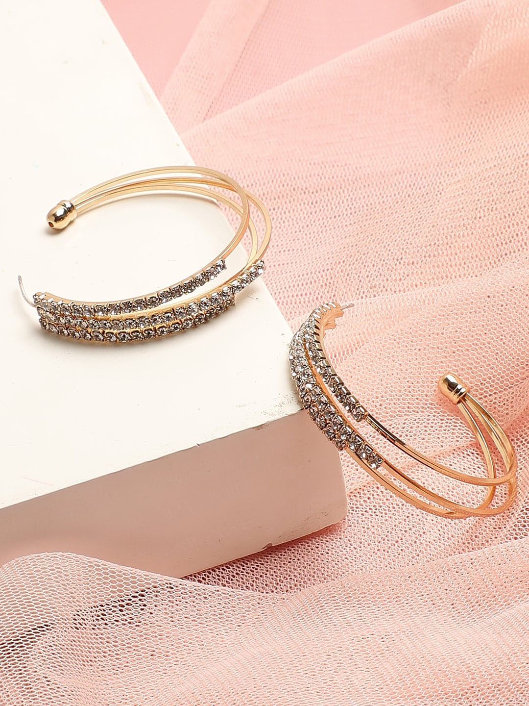 

SOHI Women Gold-Toned Contemporary Half Hoop Earrings
