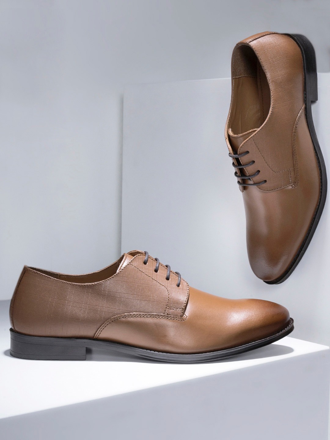 

Red Tape Men Tan Solid Leather Formal Derbys