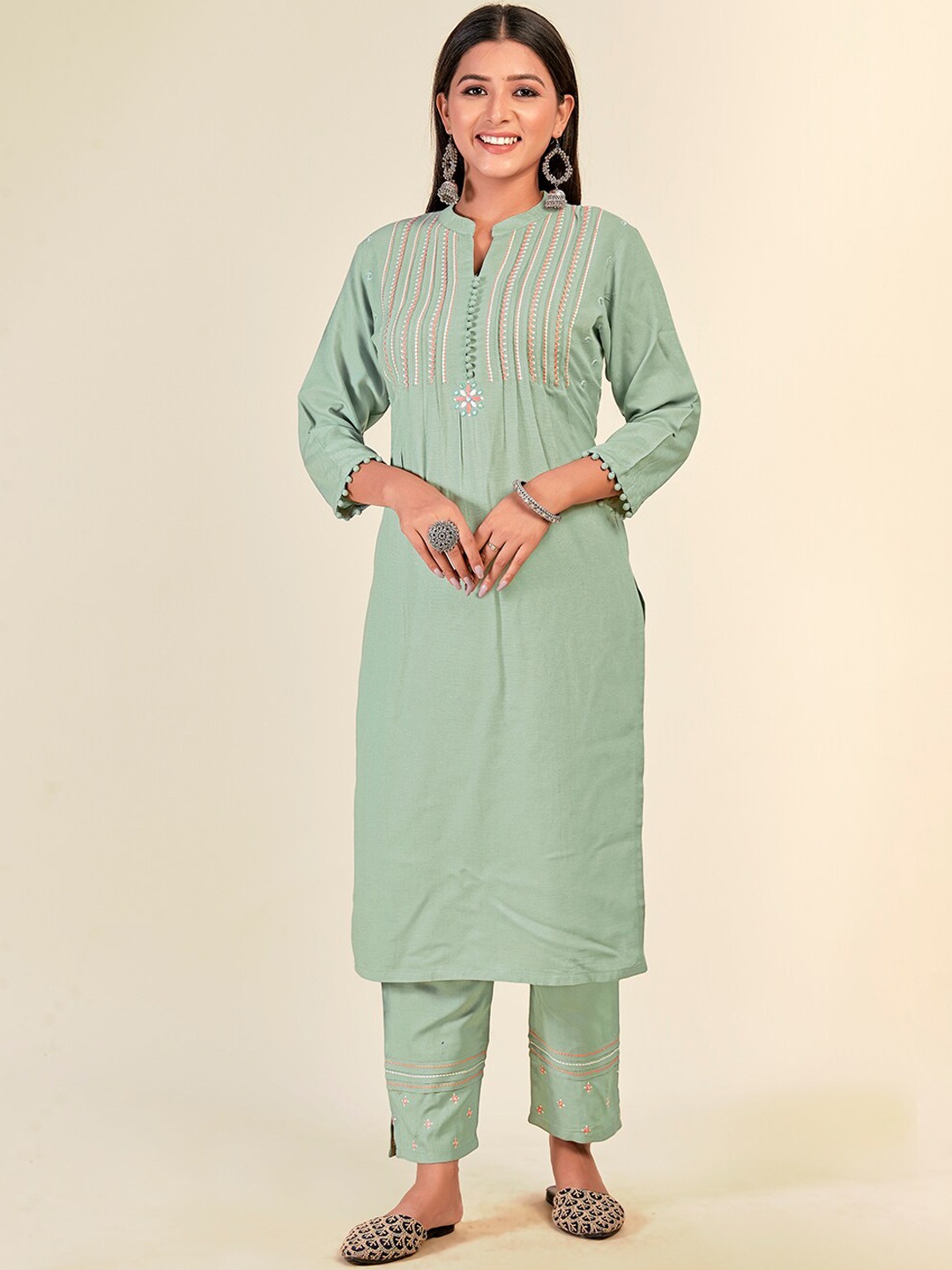 

NH KAPDEWALA Women Sea Green Embroidered Pleated Kurti With Trouser