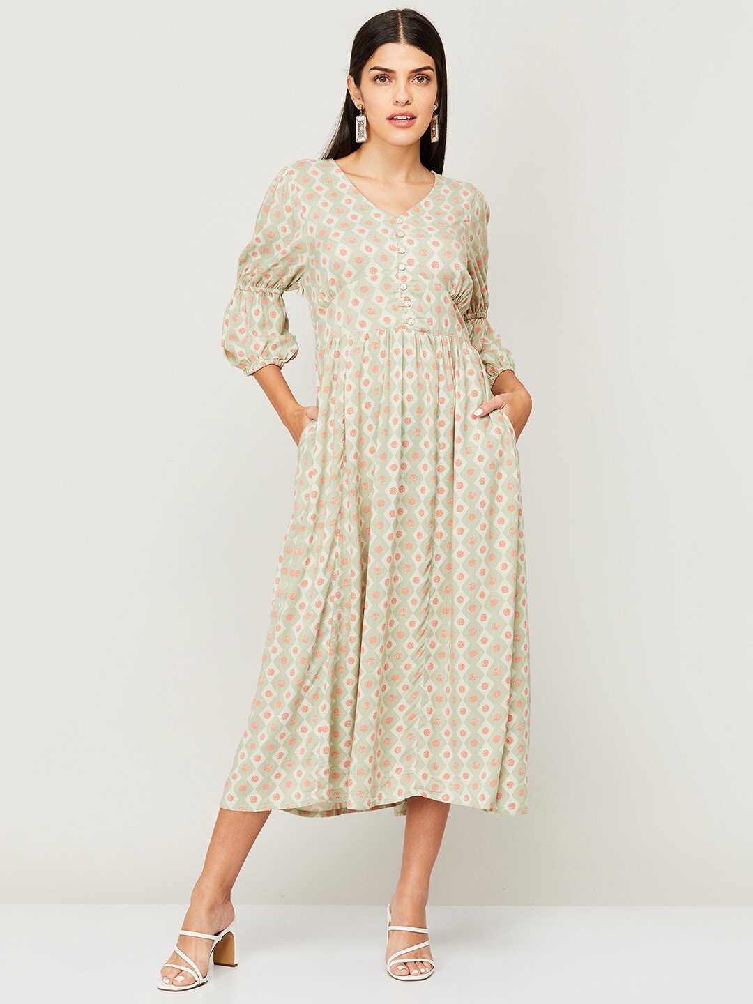 

Colour Me by Melange Green Printed Cotton A-Line Midi Dress