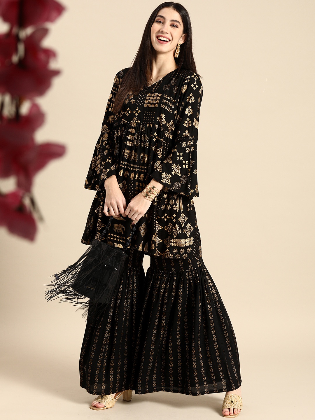 

Anouk Women Black & Golden Ethnic Motifs Printed Kurta with Sharara