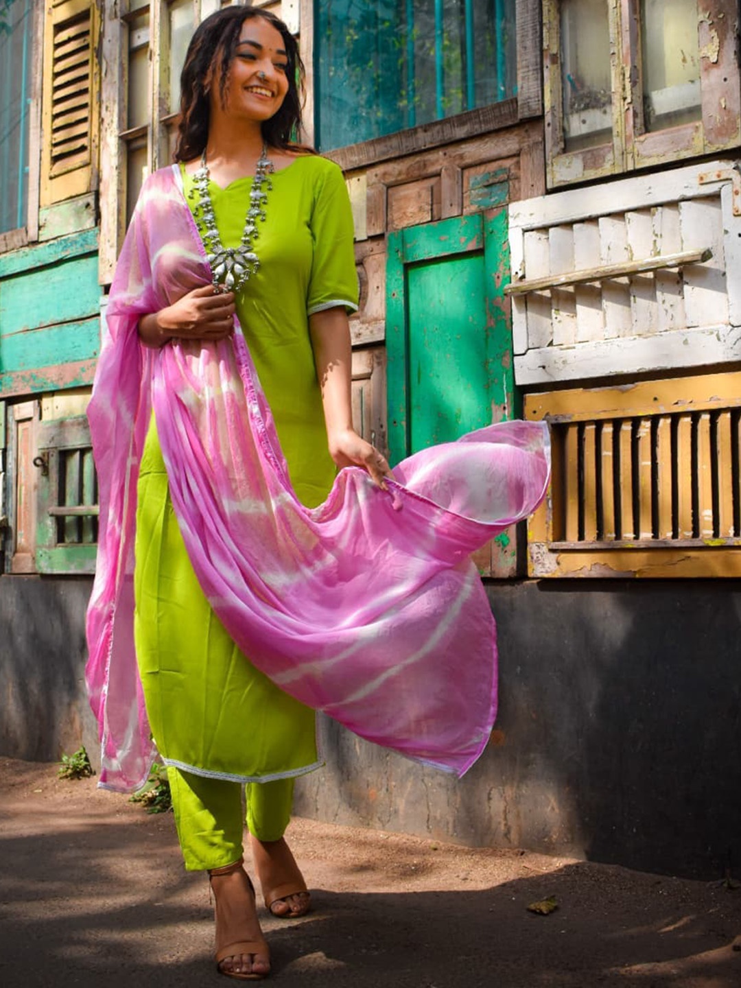 

Meeranshi Women Fluorescent Green Kurta with Trousers & With Dupatta