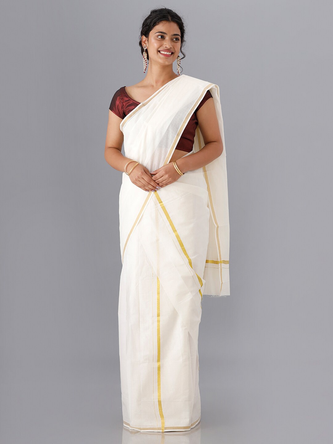 

Ramraj Cream-Coloured & Gold-Toned Solid Kasavu Saree