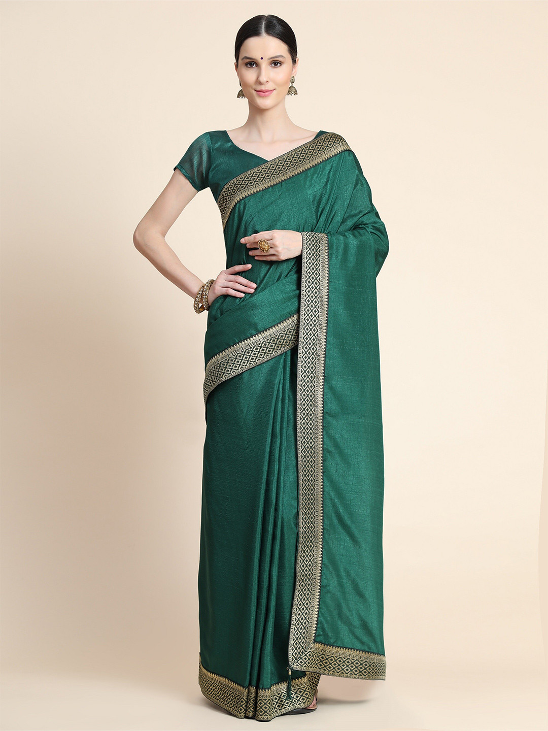 

AVANTIKA FASHION Women Green & Gold-Toned Zari Art Silk Saree