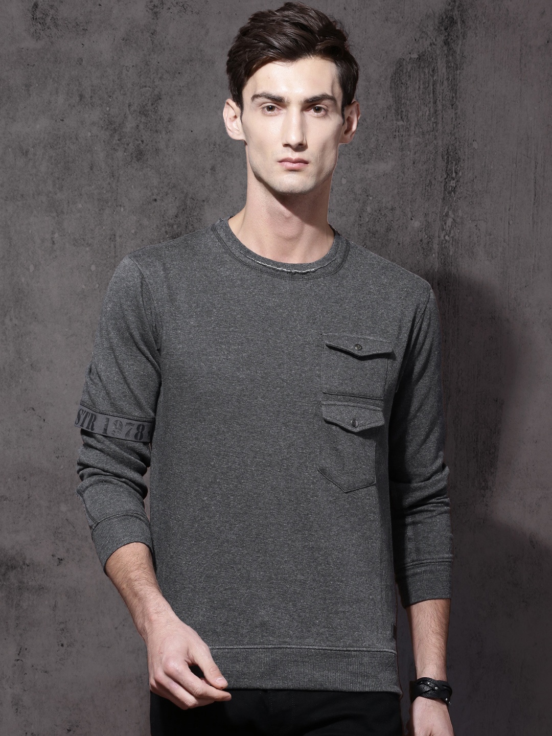 

Roadster Men Charcoal Grey Solid Sweatshirt