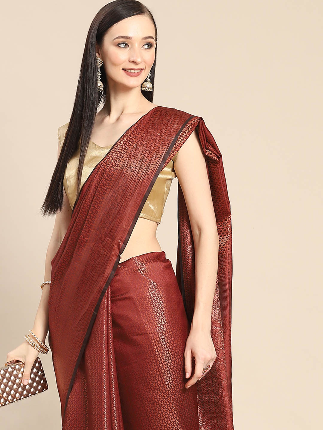 

Anouk Maroon & Golden Woven Design Zari Silk Blend Banarasi Saree