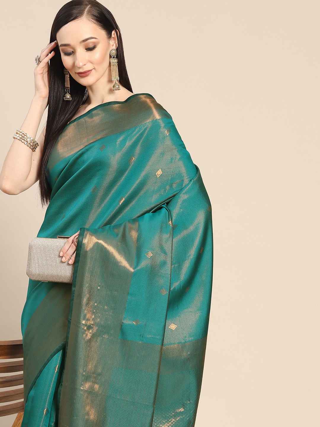 

Anouk Teal Green & Golden Woven Design Zari Silk Blend Banarasi Saree