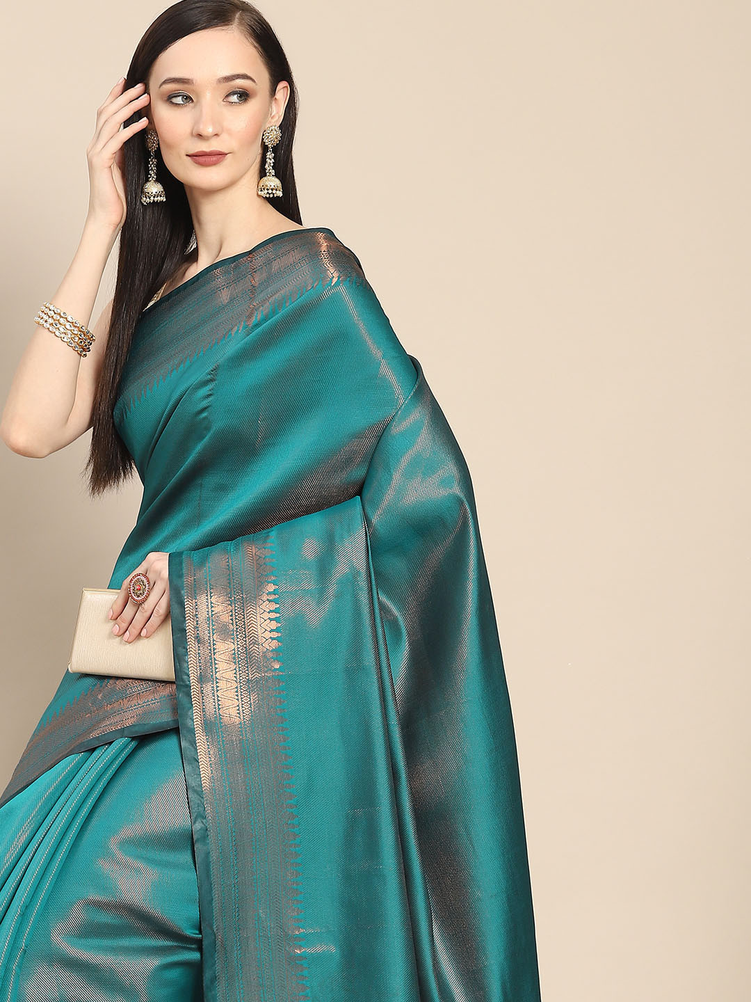 

Anouk Teal Green & Rose Gold Woven Design Zari Silk Blend Banarasi Saree