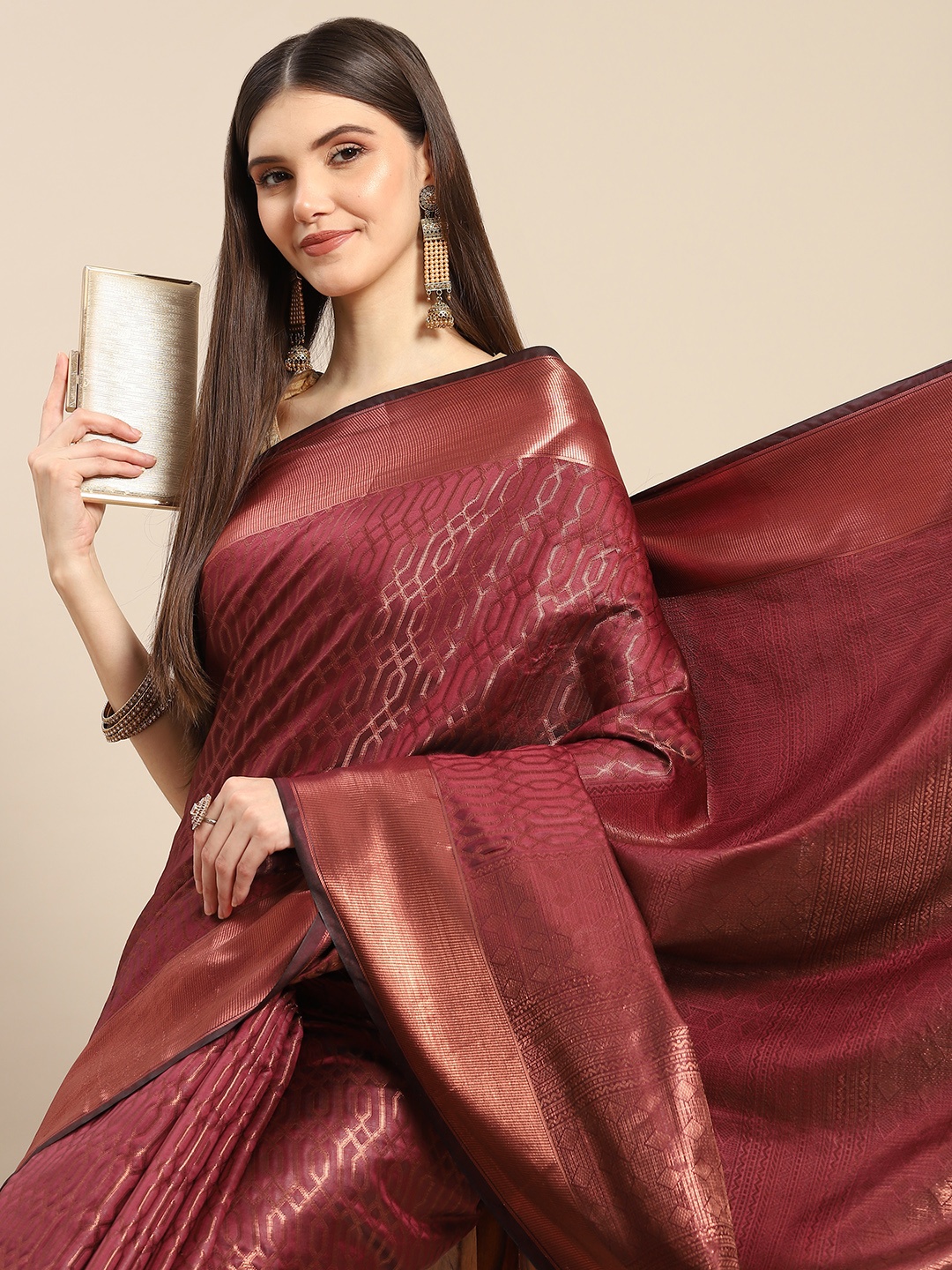 

Anouk Maroon & Golden Woven Design Zari Silk Blend Banarasi Saree