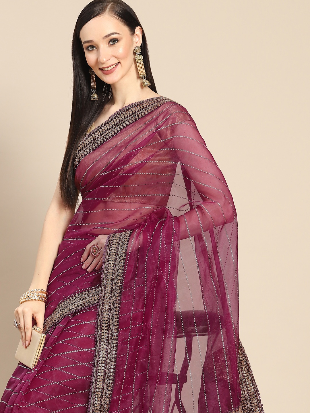 

Anouk Burgundy Striped Beads and Stones Organza Saree