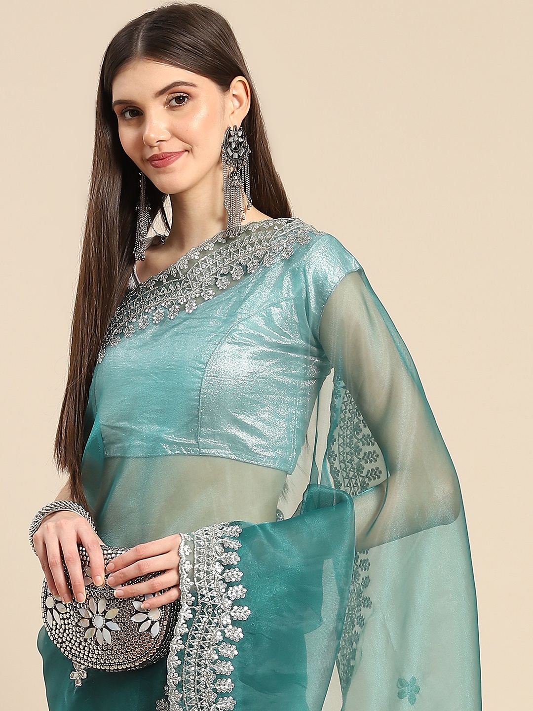 

Anouk Teal Green & Silver-Coloured Sequinned Organza Saree