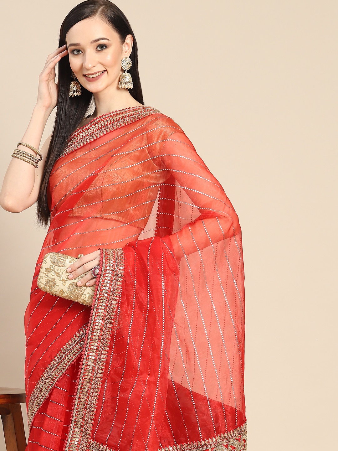 

Anouk Red Striped Beads and Stones Organza Saree