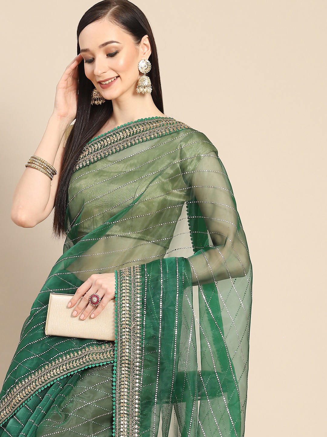 

Anouk Green & Golden Striped Beads and Stones Organza Saree